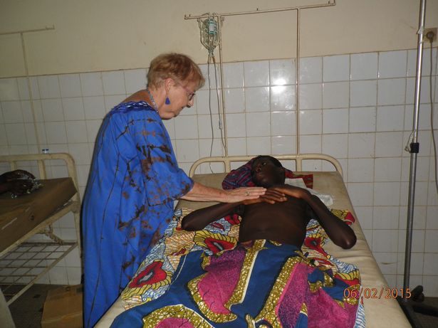 Dr Anne attending to a patient